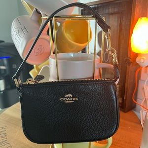 Black mini Nolita bag.